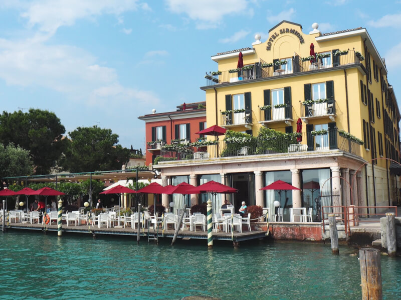 image of yellow restaurant overlooking Lake Garda