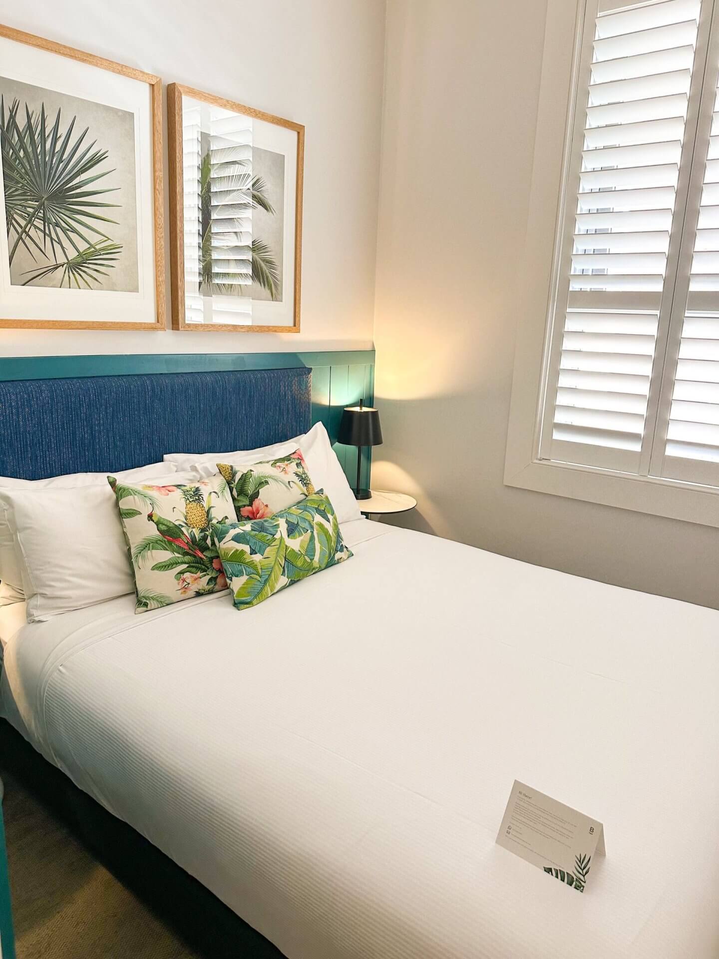 image of a bed in the Bondi Baxley with rainforest cushions