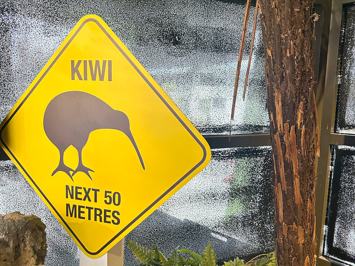 Yellow kiwi bird sign at West Coast Wildlife Centre, one of the educational things to do in Franz Josef for wildlife encounters