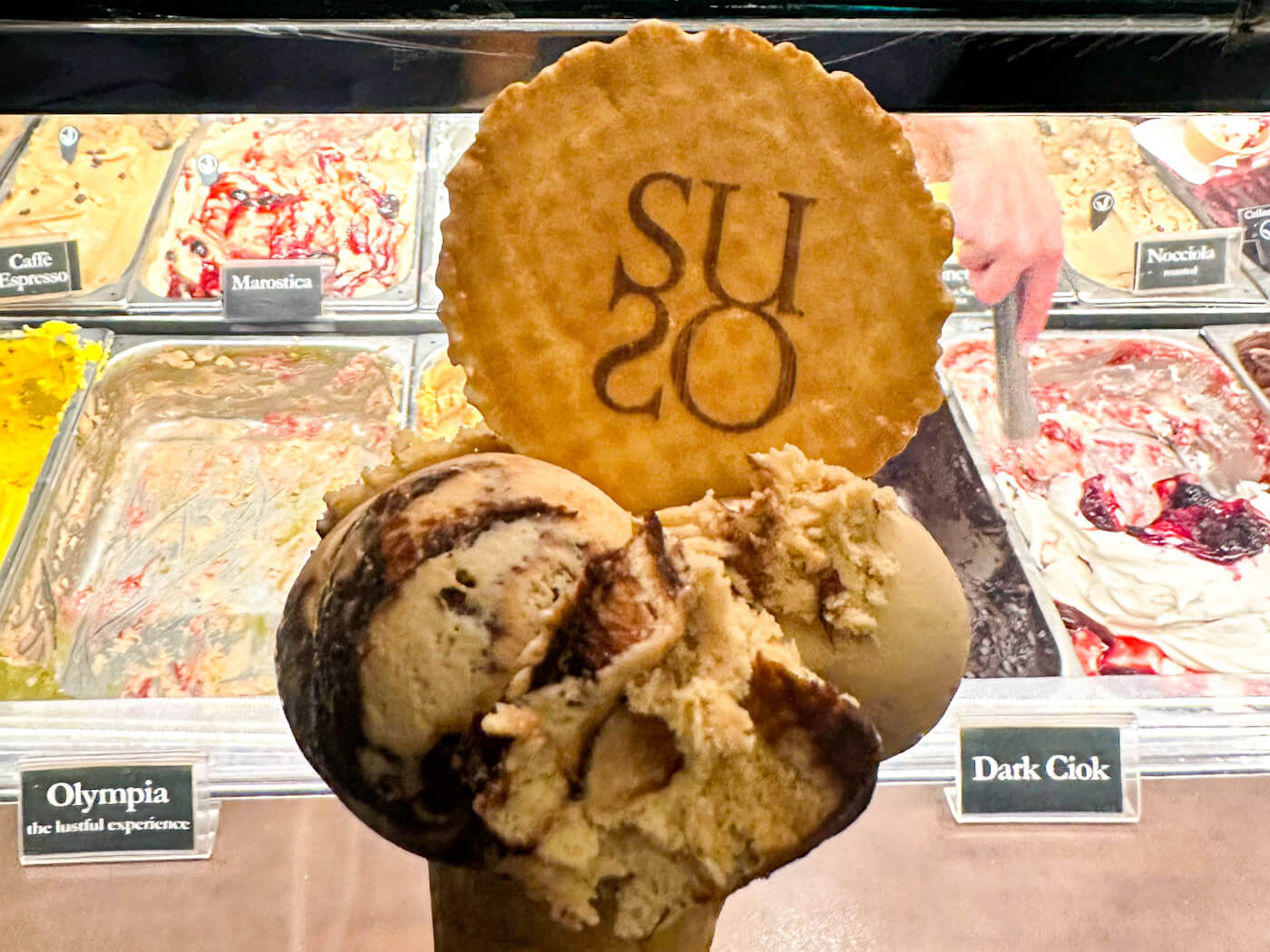 A generous cone of Olympia gelato from Suso, one of the best gelaterias and a delicious reason for where to eat in Venice.